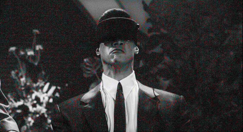 johnny mnemonic in black and white uploading data to brain gif